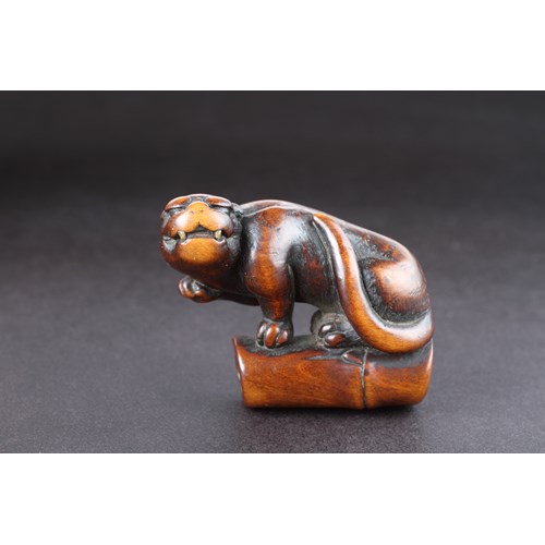 Japanese Carved Boxwood Netsuke Depicting an Angry Tiger